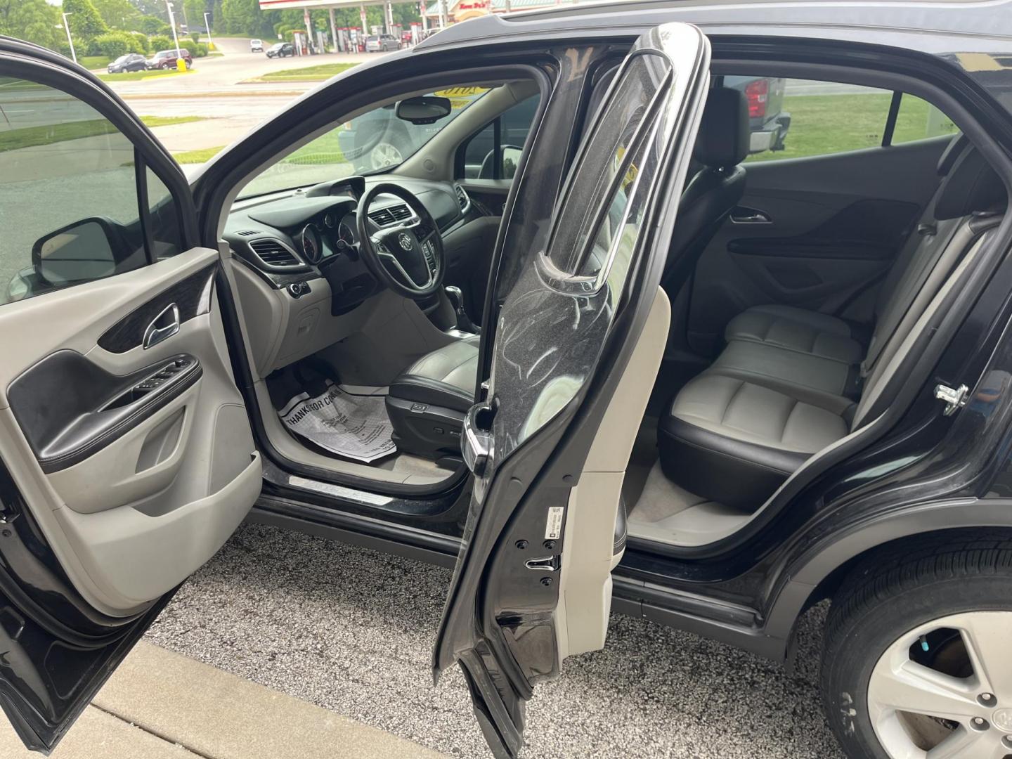 2016 Carbon Black Metalli Buick Encore Leather AWD (KL4CJGSB1GB) with an 1.4L L4 DOHC 16V TUR engine, 6-Speed Automatic transmission, located at 1633 W Kimberly, Davenport, IA, 52806, (563) 323-5341, 41.559456, -90.598732 - Photo#8