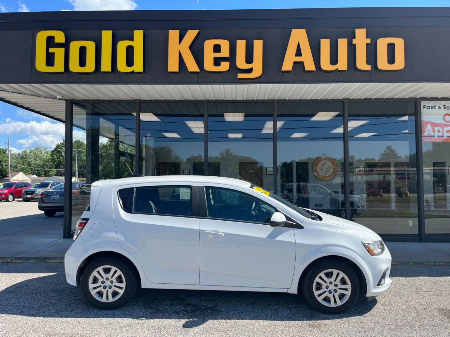 2017 White Chevrolet Sonic FL Auto Hatchback (1G1JG6SH4H4) with an 1.8L L4 DOHC 24V engine, 6-Speed Automatic transmission, located at 1633 W Kimberly, Davenport, IA, 52806, (563) 323-5341, 41.559456, -90.598732 - Photo#0