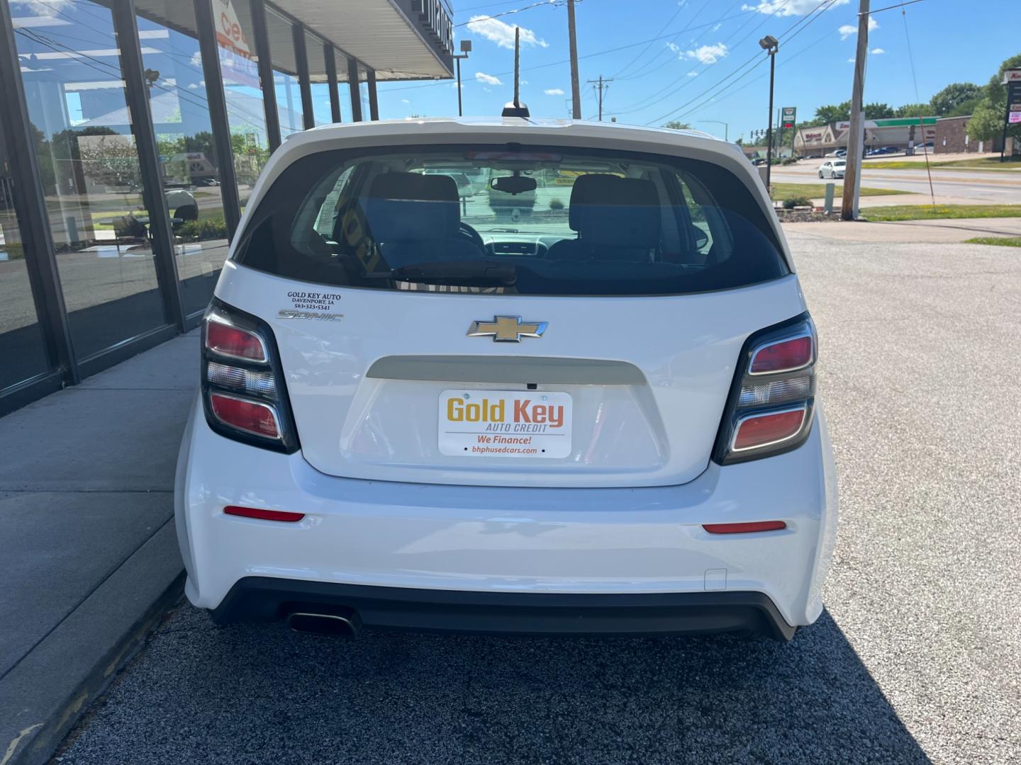 2017 White Chevrolet Sonic FL Auto Hatchback (1G1JG6SH4H4) with an 1.8L L4 DOHC 24V engine, 6-Speed Automatic transmission, located at 1633 W Kimberly, Davenport, IA, 52806, (563) 323-5341, 41.559456, -90.598732 - Photo#4