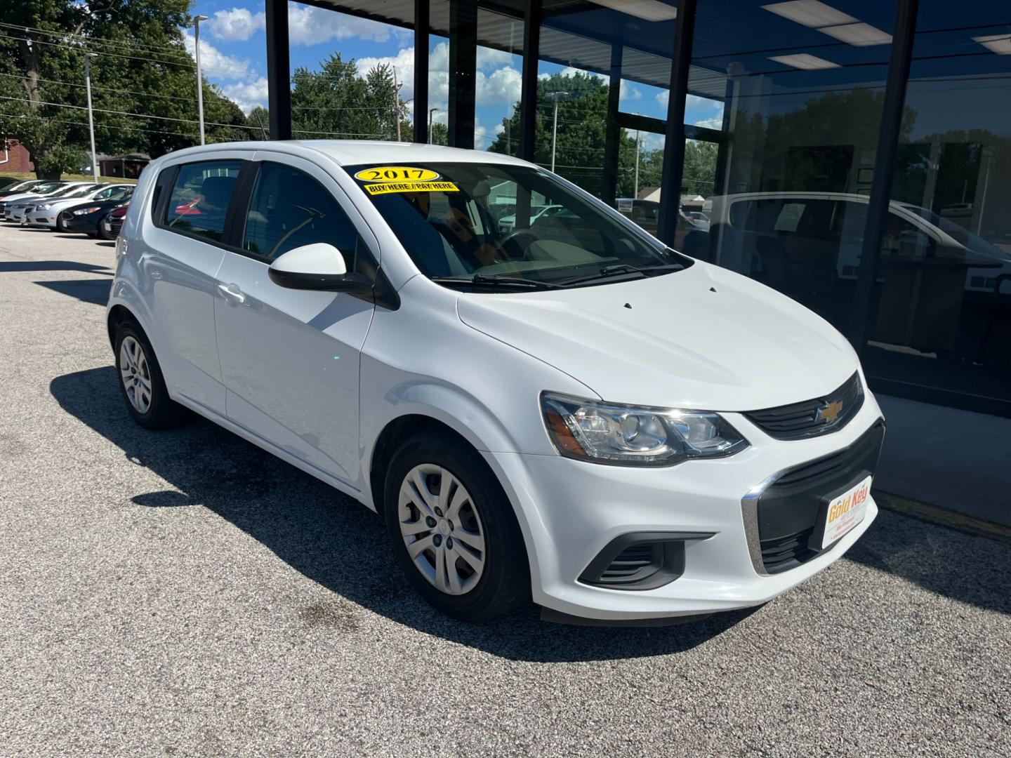 2017 White Chevrolet Sonic FL Auto Hatchback (1G1JG6SH4H4) with an 1.8L L4 DOHC 24V engine, 6-Speed Automatic transmission, located at 1633 W Kimberly, Davenport, IA, 52806, (563) 323-5341, 41.559456, -90.598732 - Photo#2