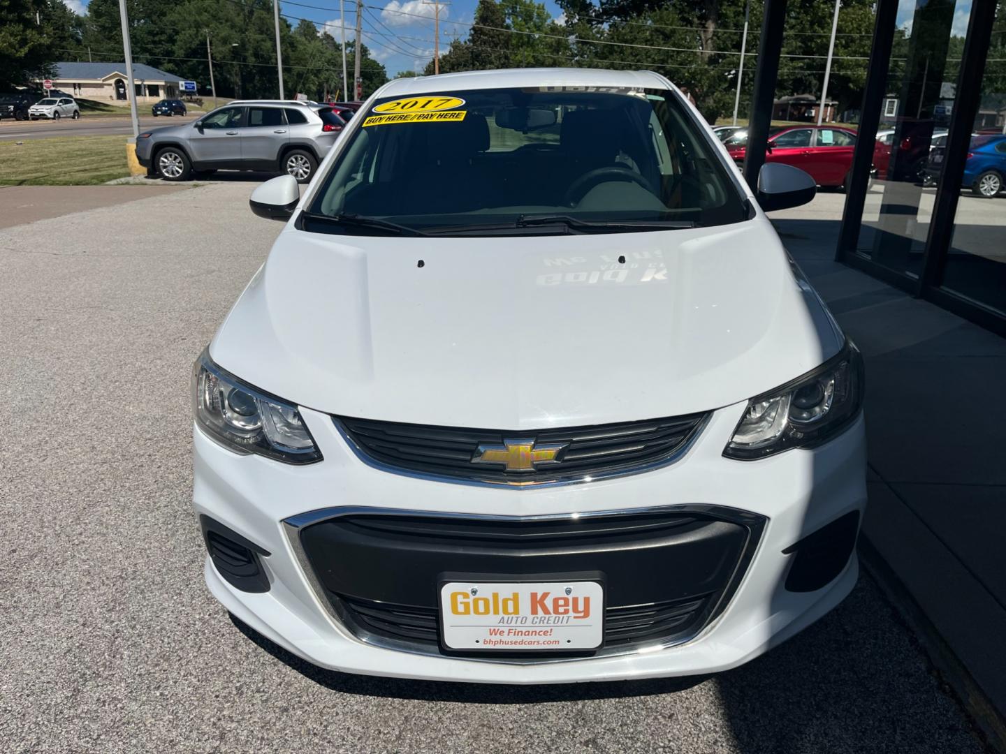 2017 White Chevrolet Sonic FL Auto Hatchback (1G1JG6SH4H4) with an 1.8L L4 DOHC 24V engine, 6-Speed Automatic transmission, located at 1633 W Kimberly, Davenport, IA, 52806, (563) 323-5341, 41.559456, -90.598732 - Photo#1