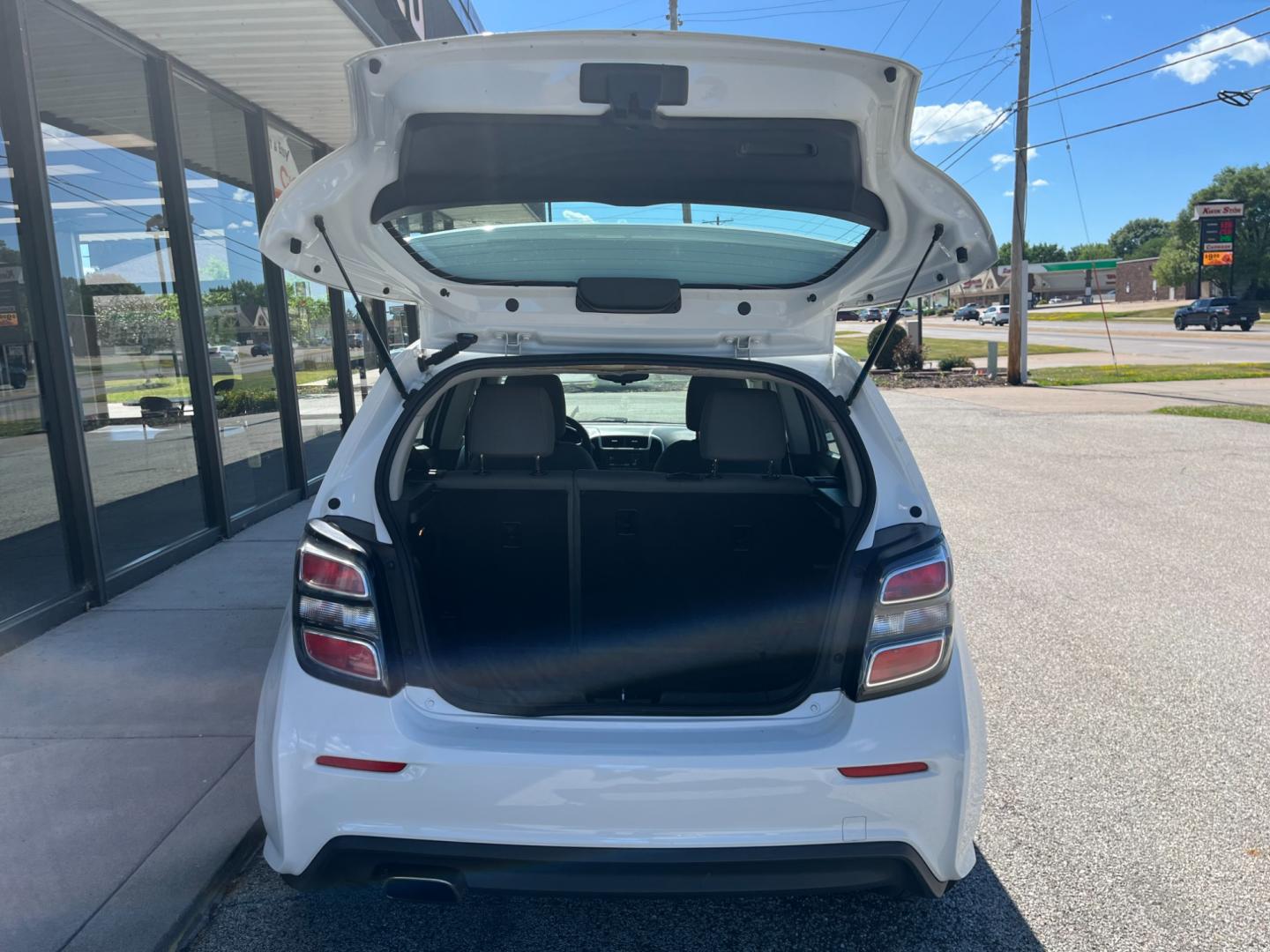 2017 White Chevrolet Sonic FL Auto Hatchback (1G1JG6SH4H4) with an 1.8L L4 DOHC 24V engine, 6-Speed Automatic transmission, located at 1633 W Kimberly, Davenport, IA, 52806, (563) 323-5341, 41.559456, -90.598732 - Photo#5