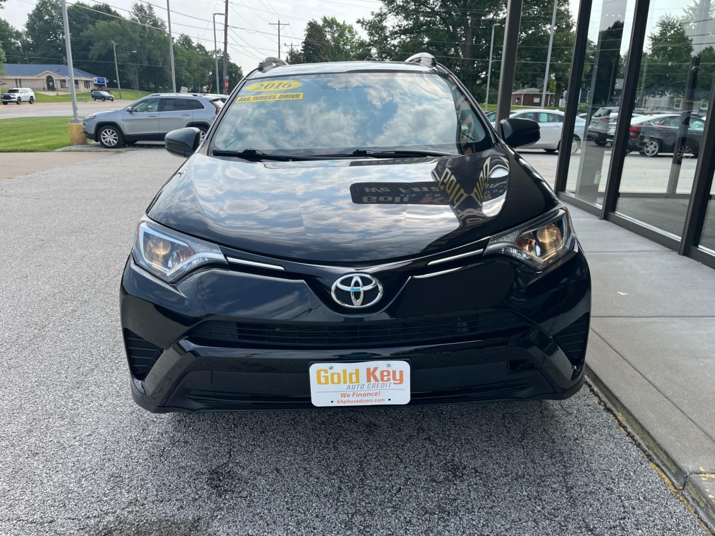 2016 Black Toyota RAV4 LE AWD (2T3BFREV1GW) with an 2.5L L4 DOHC 16V engine, 6-Speed Automatic transmission, located at 1633 W Kimberly, Davenport, IA, 52806, (563) 323-5341, 41.559456, -90.598732 - Photo#0