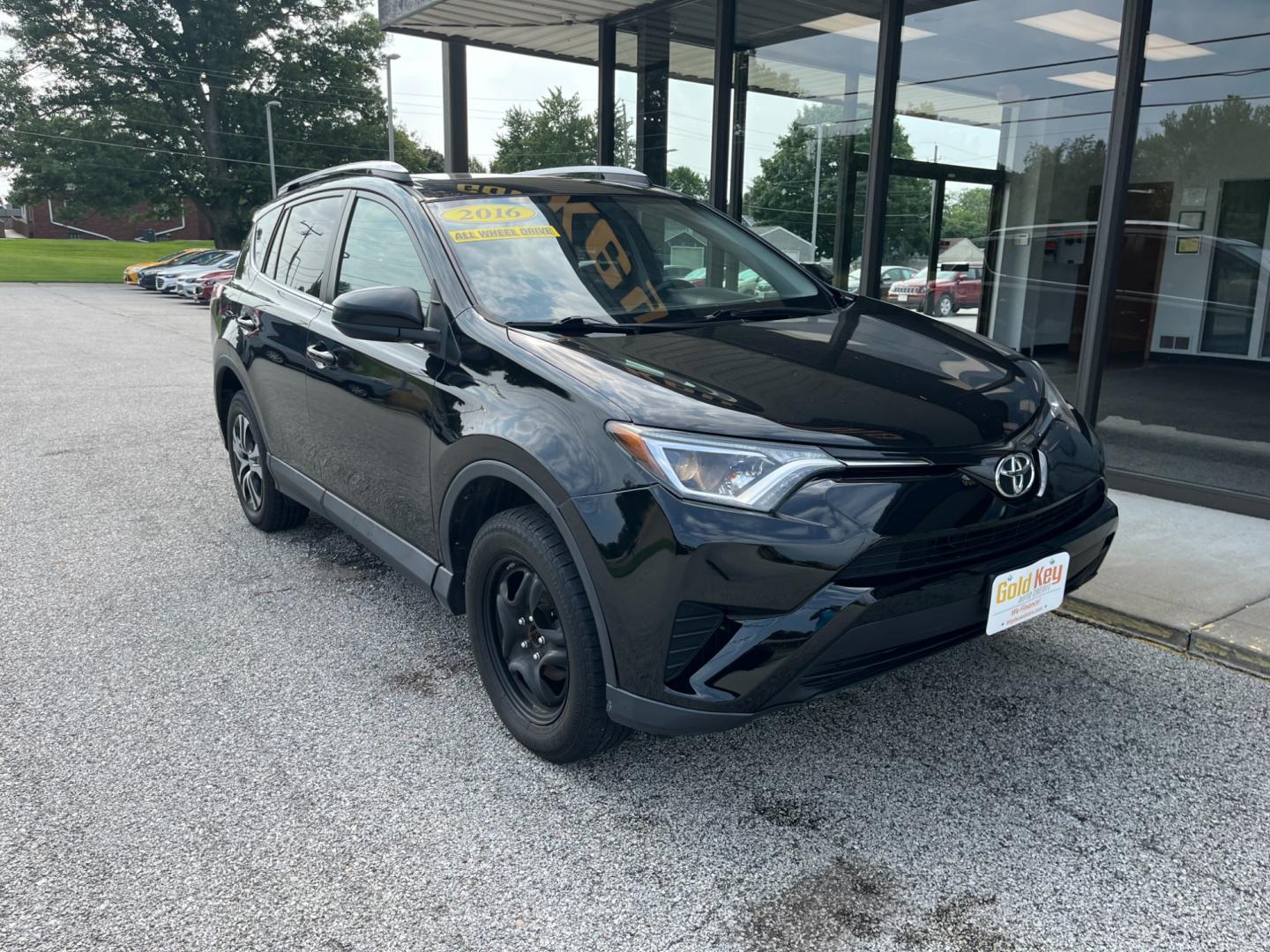 2016 Black Toyota RAV4 LE AWD (2T3BFREV1GW) with an 2.5L L4 DOHC 16V engine, 6-Speed Automatic transmission, located at 1633 W Kimberly, Davenport, IA, 52806, (563) 323-5341, 41.559456, -90.598732 - Photo#1
