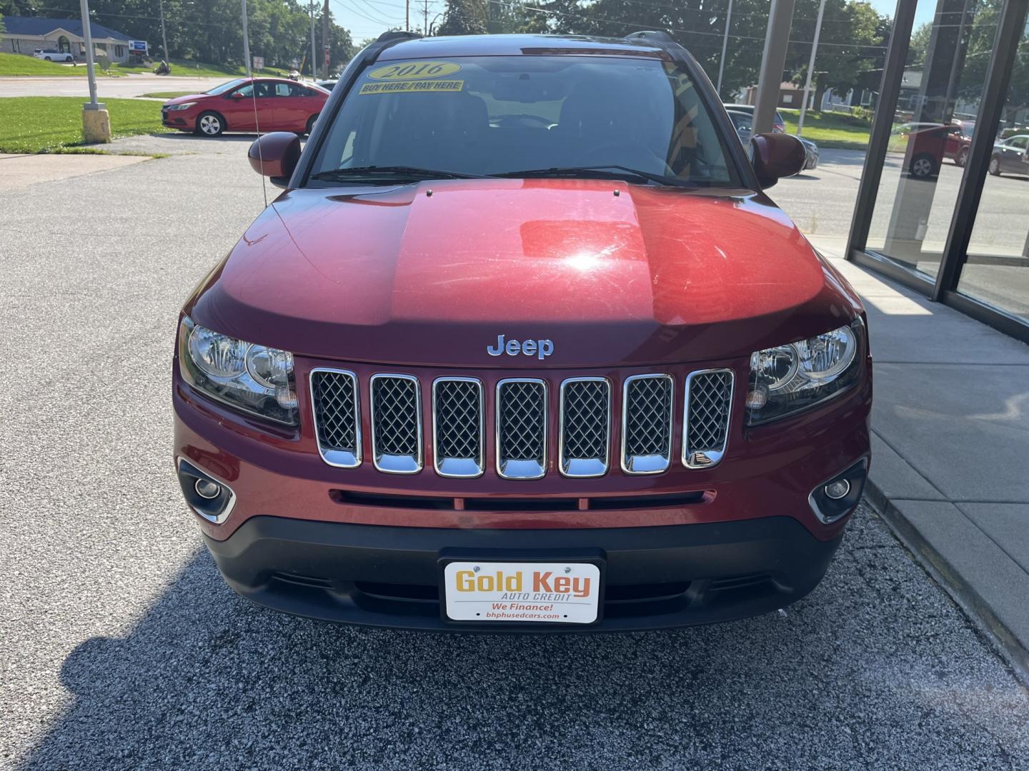 2016 Red Jeep Compass Latitude FWD (1C4NJCEA9GD) with an 2.0L L4 DOHC 16V engine, Continuously Variabl transmission, located at 1633 W Kimberly, Davenport, IA, 52806, (563) 323-5341, 41.559456, -90.598732- Photo#1