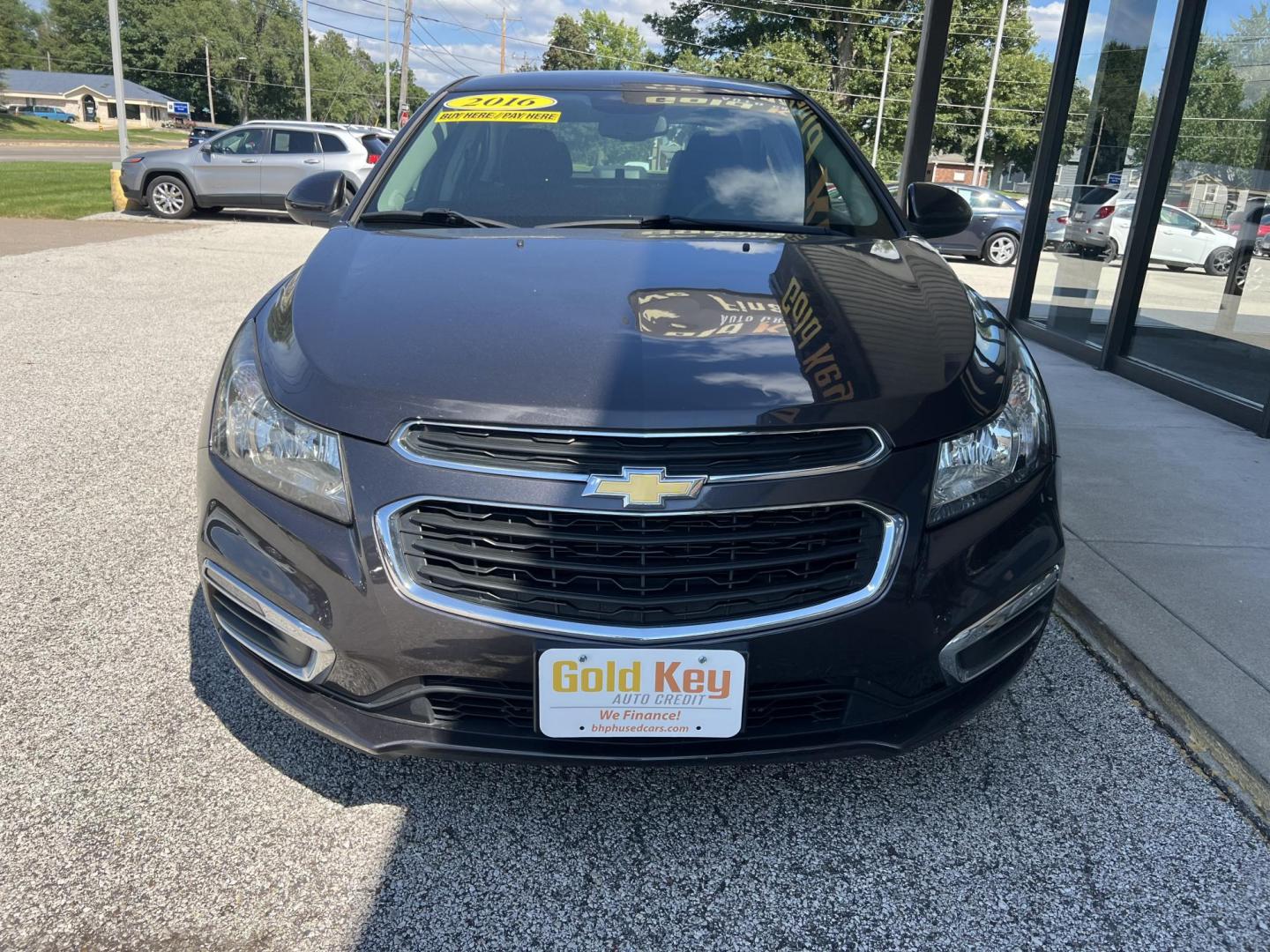 2016 Black Chevrolet Cruze Limited 1LT Auto (1G1PE5SBXG7) with an 1.4L L4 DOHC 16V TUR engine, 6-Speed Automatic transmission, located at 1633 W Kimberly, Davenport, IA, 52806, (563) 323-5341, 41.559456, -90.598732 - Photo#2