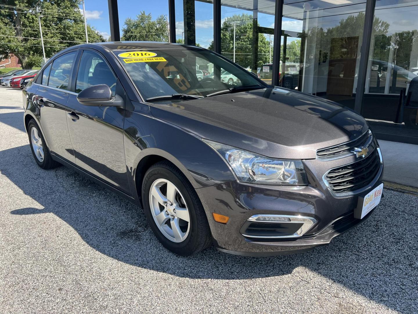 2016 Black Chevrolet Cruze Limited 1LT Auto (1G1PE5SBXG7) with an 1.4L L4 DOHC 16V TUR engine, 6-Speed Automatic transmission, located at 1633 W Kimberly, Davenport, IA, 52806, (563) 323-5341, 41.559456, -90.598732 - Photo#1