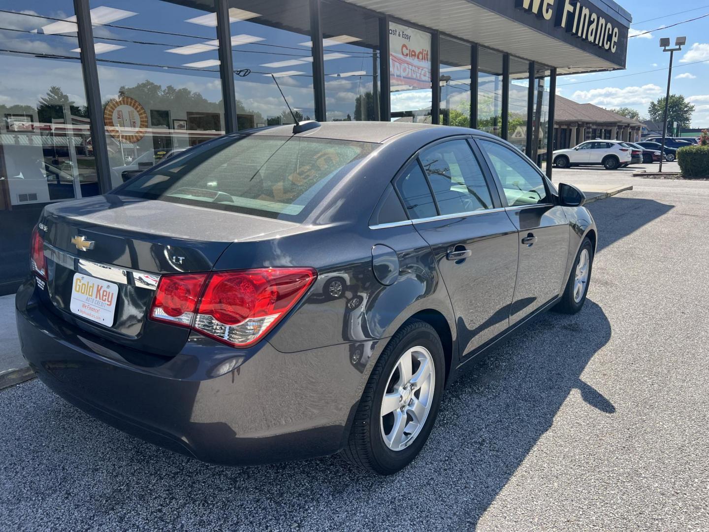 2016 Black Chevrolet Cruze Limited 1LT Auto (1G1PE5SBXG7) with an 1.4L L4 DOHC 16V TUR engine, 6-Speed Automatic transmission, located at 1633 W Kimberly, Davenport, IA, 52806, (563) 323-5341, 41.559456, -90.598732 - Photo#3