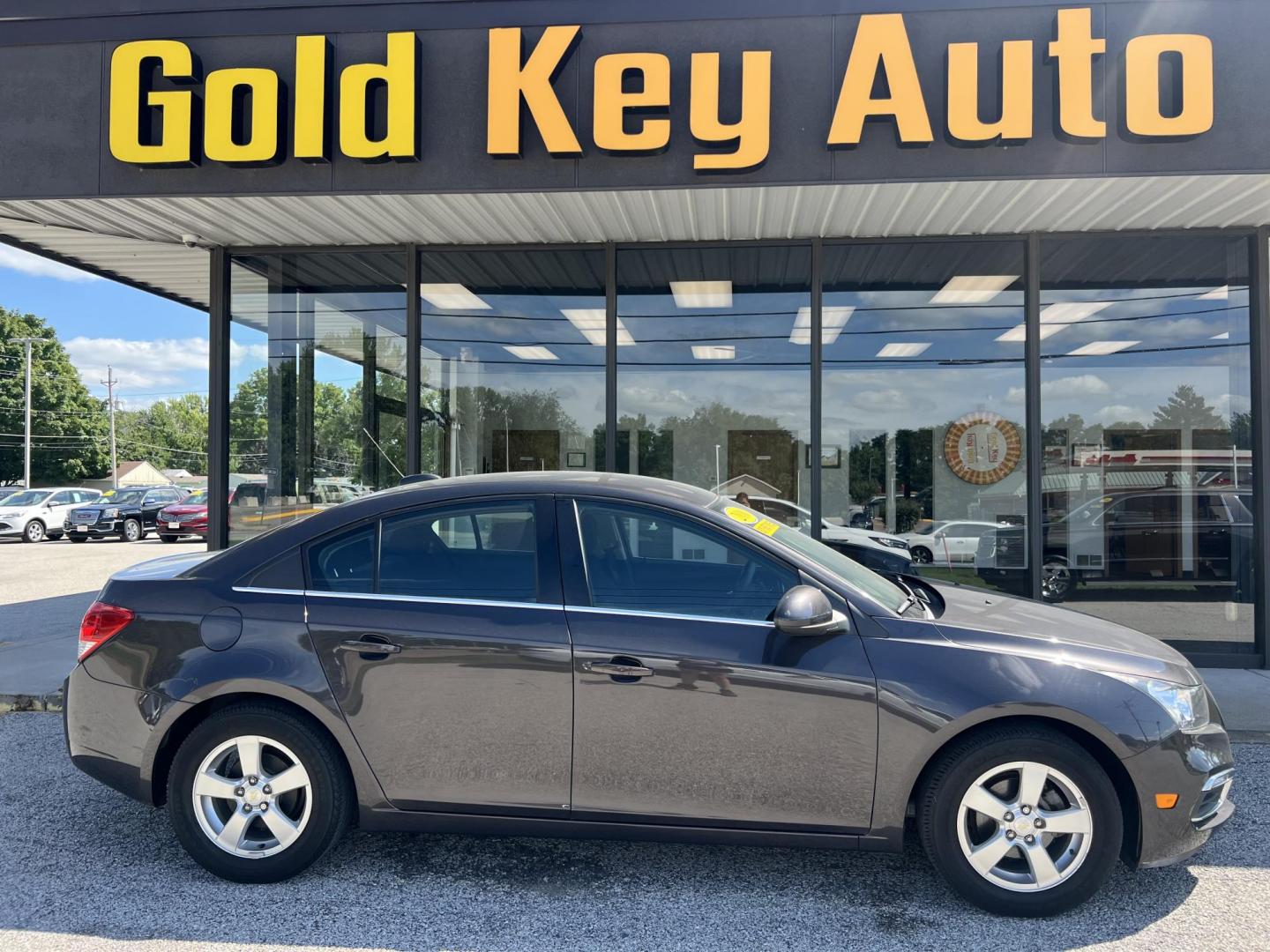 2016 Black Chevrolet Cruze Limited 1LT Auto (1G1PE5SBXG7) with an 1.4L L4 DOHC 16V TUR engine, 6-Speed Automatic transmission, located at 1633 W Kimberly, Davenport, IA, 52806, (563) 323-5341, 41.559456, -90.598732 - Photo#0