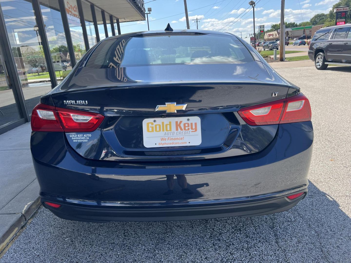 2016 Blue Velvet Metallic Chevrolet Malibu 1LT (1G1ZE5ST7GF) with an 1.5L L4 DOHC 16V engine, 6-Speed Automatic transmission, located at 1633 W Kimberly, Davenport, IA, 52806, (563) 323-5341, 41.559456, -90.598732 - Photo#4