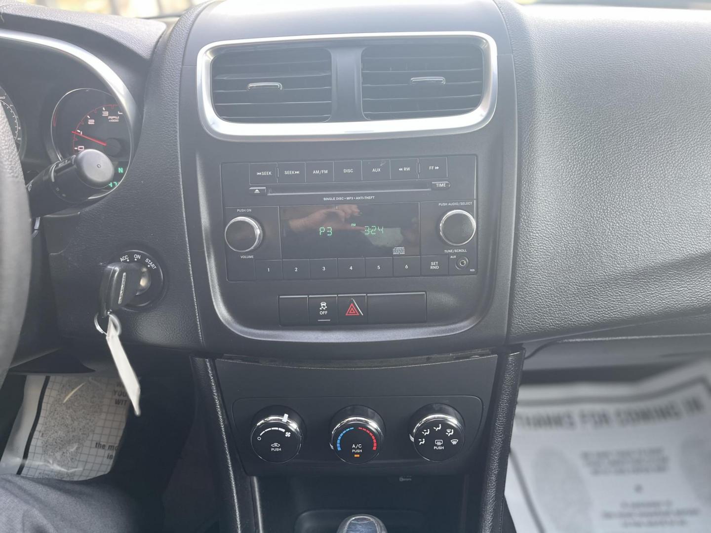 2013 Blue Dodge Avenger Base (1C3CDZAB6DN) with an 2.4L L4 DOHC 16V engine, 4-Speed Automatic transmission, located at 1633 W Kimberly, Davenport, IA, 52806, (563) 323-5341, 41.559456, -90.598732 - Photo#7
