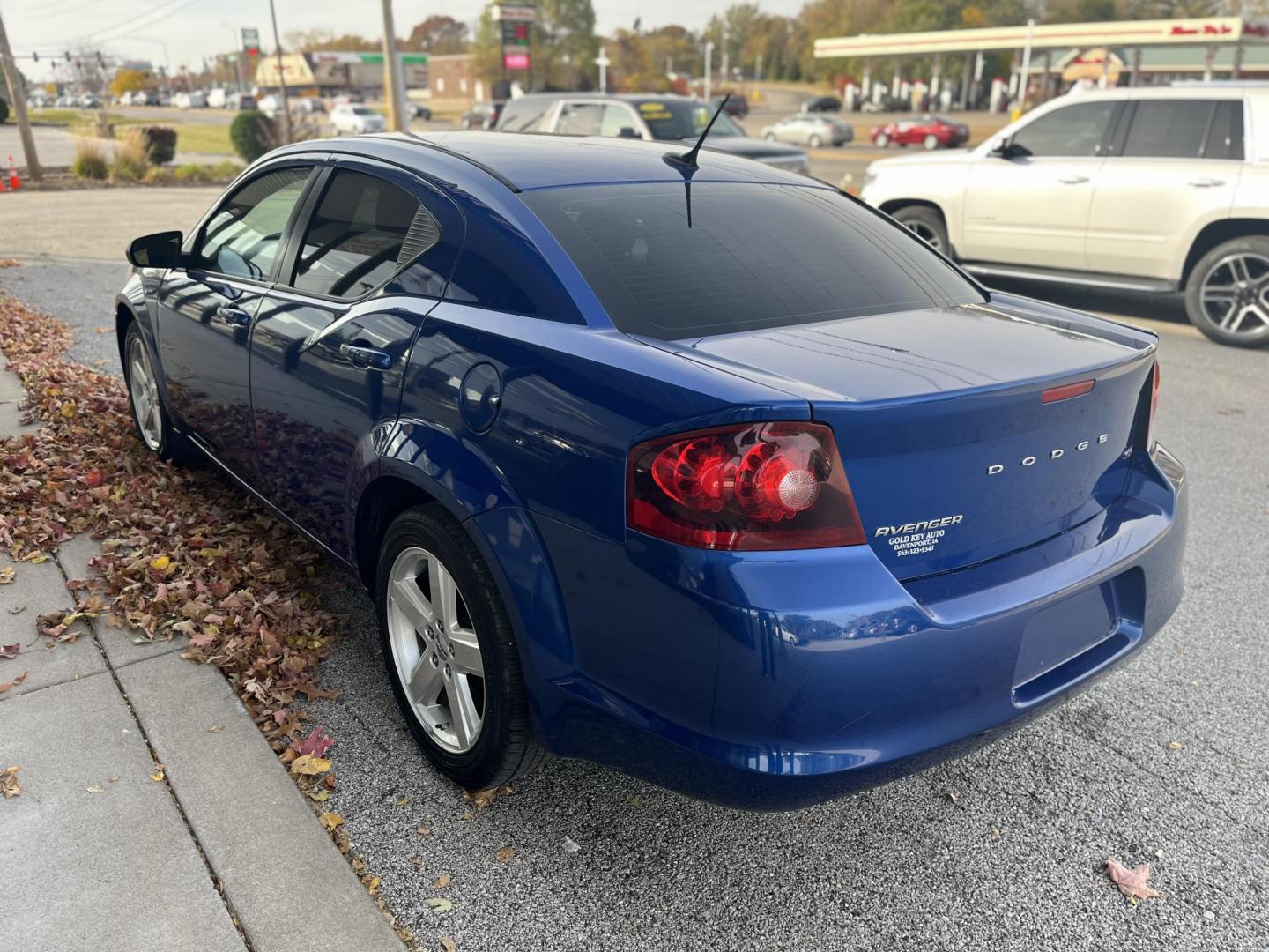 2013 Blue Dodge Avenger Base (1C3CDZAB6DN) with an 2.4L L4 DOHC 16V engine, 4-Speed Automatic transmission, located at 1633 W Kimberly, Davenport, IA, 52806, (563) 323-5341, 41.559456, -90.598732 - Photo#3