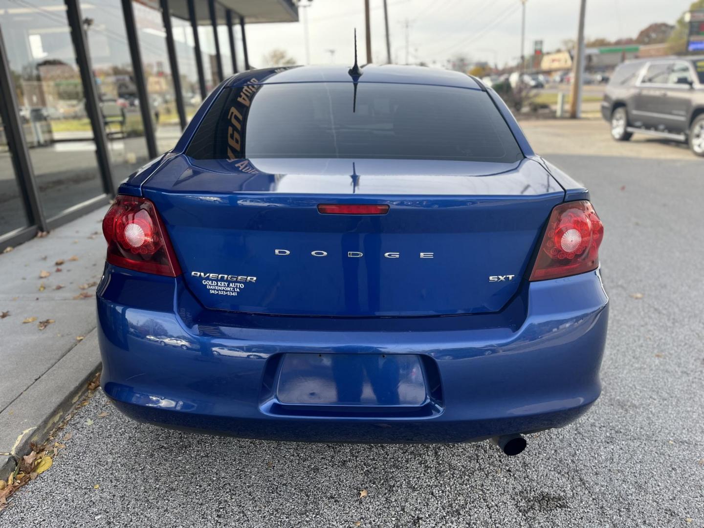 2013 Blue Dodge Avenger Base (1C3CDZAB6DN) with an 2.4L L4 DOHC 16V engine, 4-Speed Automatic transmission, located at 1633 W Kimberly, Davenport, IA, 52806, (563) 323-5341, 41.559456, -90.598732 - Photo#4