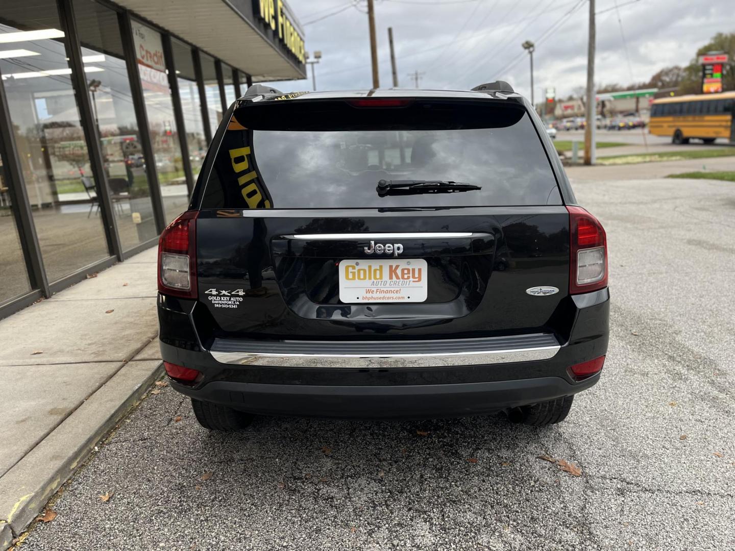 2015 Black Clear Coat Jeep Compass Latitude 4WD (1C4NJDEB1FD) with an 2.4L L4 DOHC 16V engine, 6-Speed Automatic transmission, located at 1633 W Kimberly, Davenport, IA, 52806, (563) 323-5341, 41.559456, -90.598732 - Photo#4