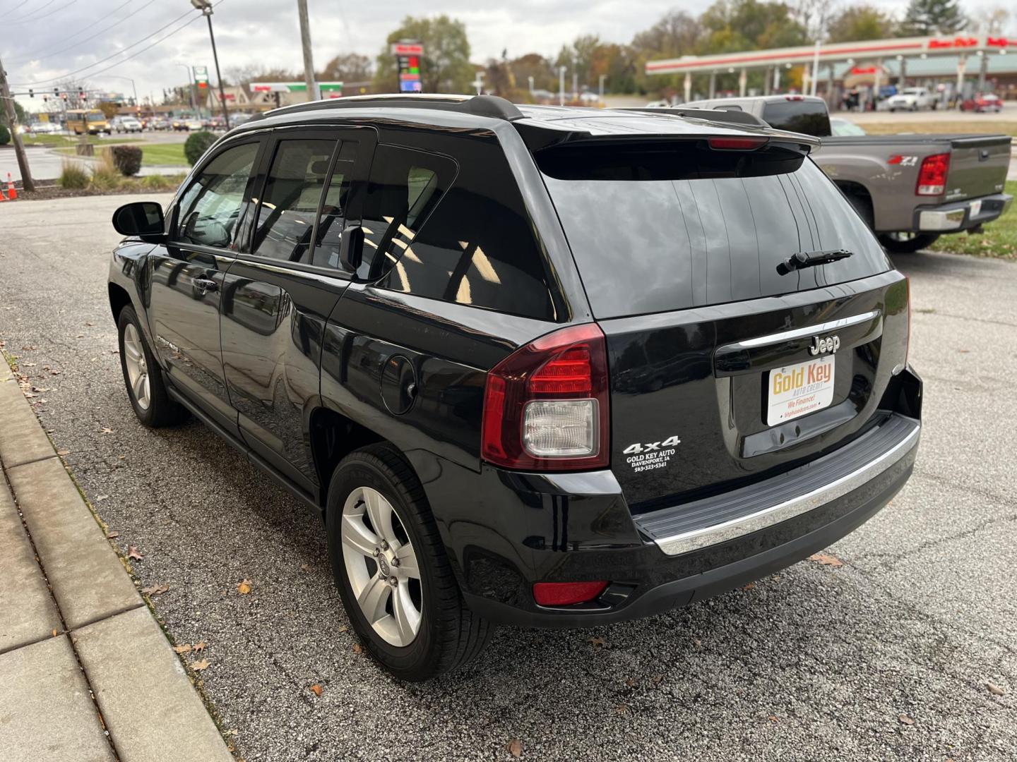 2015 Black Clear Coat Jeep Compass Latitude 4WD (1C4NJDEB1FD) with an 2.4L L4 DOHC 16V engine, 6-Speed Automatic transmission, located at 1633 W Kimberly, Davenport, IA, 52806, (563) 323-5341, 41.559456, -90.598732 - Photo#3