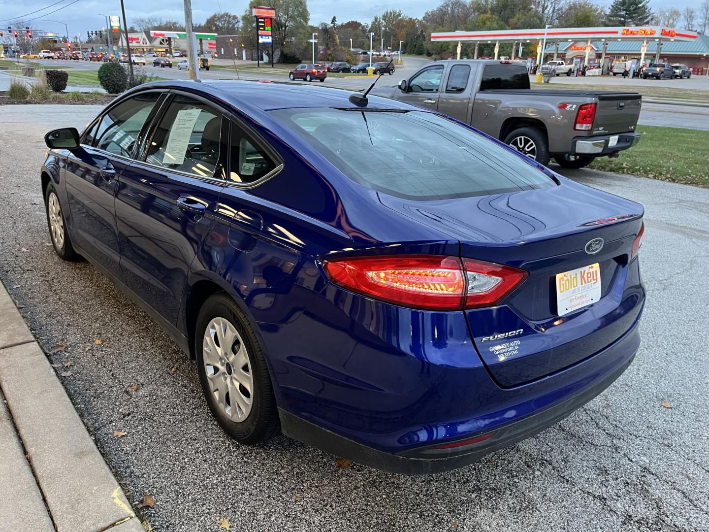 2014 Deep Impact Blue Ford Fusion S (1FA6P0G75E5) with an 2.5L L4 DOHC 16V engine, located at 1633 W Kimberly, Davenport, IA, 52806, (563) 323-5341, 41.559456, -90.598732 - Photo#3