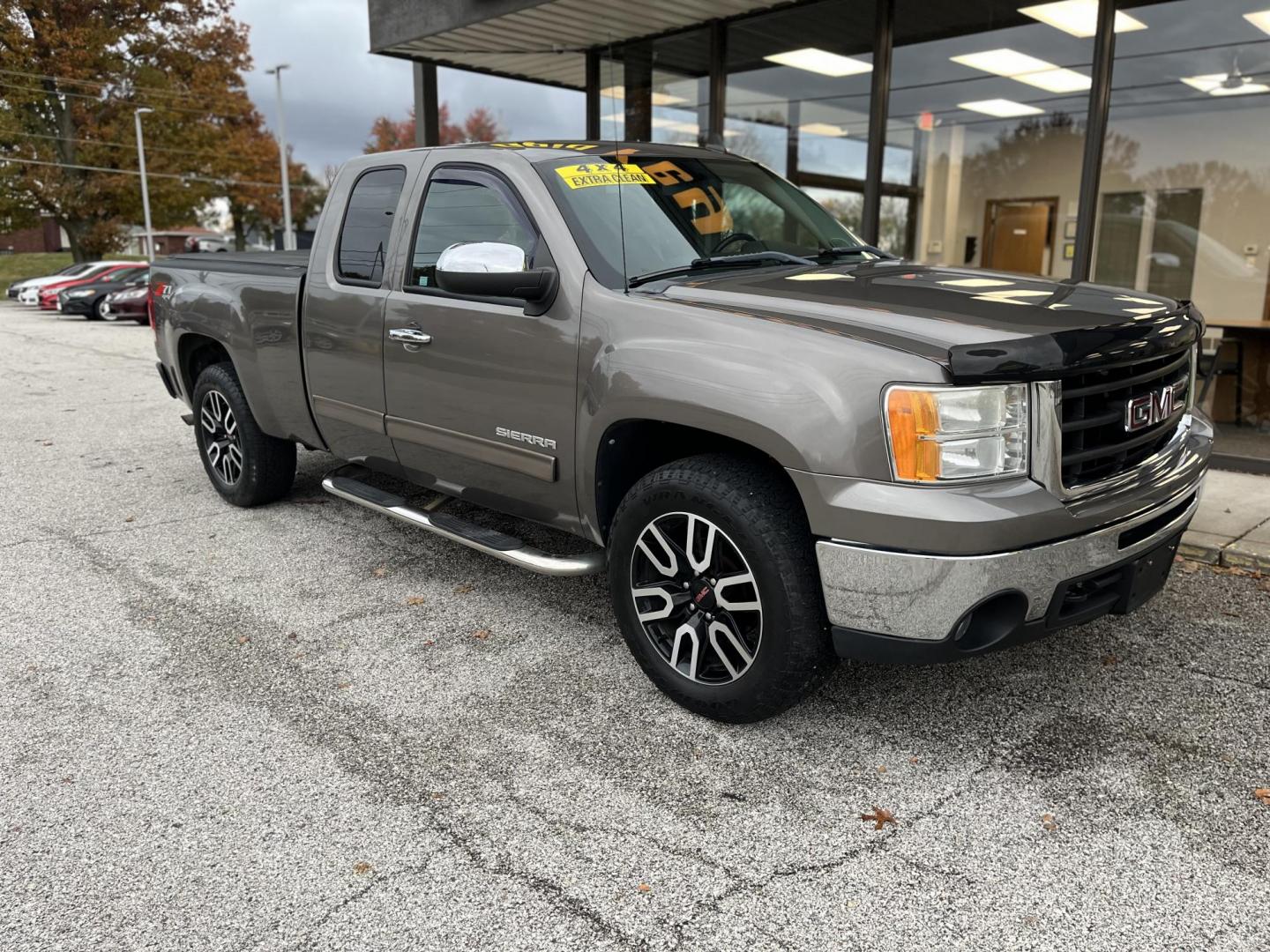 2011 Mocha Bronze GMC Sierra 1500 SLE Ext. Cab 4WD (1GTR2VE37BZ) with an 5.3L V8 OHV 16V FFV engine, 6-Speed Automatic transmission, located at 1633 W Kimberly, Davenport, IA, 52806, (563) 323-5341, 41.559456, -90.598732 - Photo#2