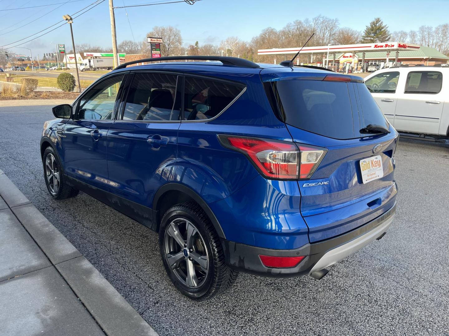 2017 Lightning Blue Metallic Ford Escape SE FWD (1FMCU0GD8HU) with an 1.5L L4 DOHC 16V engine, 6-Speed Automatic transmission, located at 1633 W Kimberly, Davenport, IA, 52806, (563) 323-5341, 41.559456, -90.598732 - Photo#3