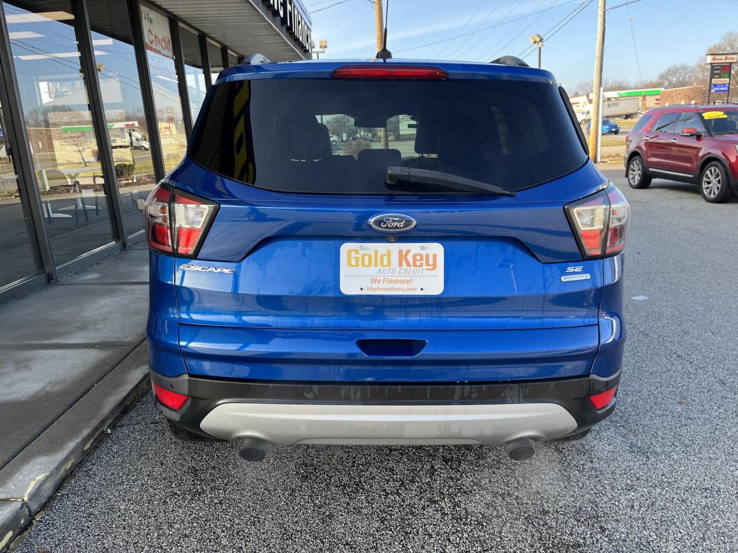 2017 Lightning Blue Metallic Ford Escape SE FWD (1FMCU0GD8HU) with an 1.5L L4 DOHC 16V engine, 6-Speed Automatic transmission, located at 1633 W Kimberly, Davenport, IA, 52806, (563) 323-5341, 41.559456, -90.598732 - Photo#4