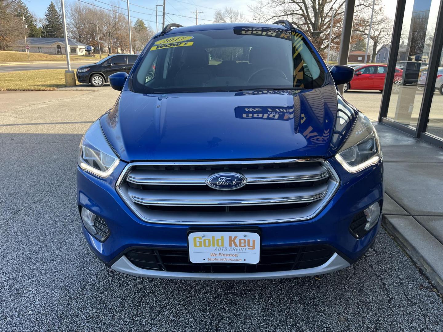 2017 Lightning Blue Metallic Ford Escape SE FWD (1FMCU0GD8HU) with an 1.5L L4 DOHC 16V engine, 6-Speed Automatic transmission, located at 1633 W Kimberly, Davenport, IA, 52806, (563) 323-5341, 41.559456, -90.598732 - Photo#1