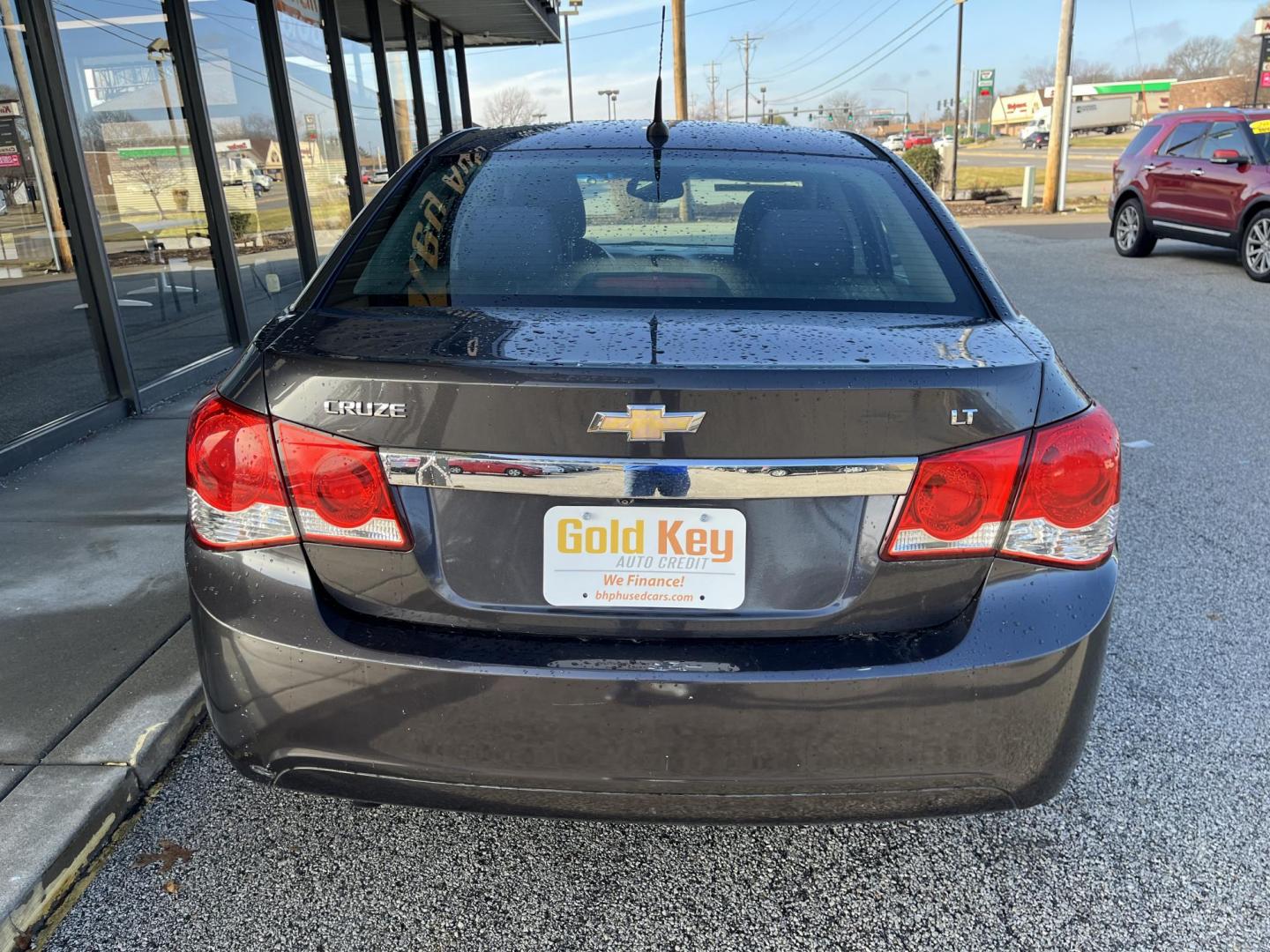 2014 Black Granite Metallic Chevrolet Cruze 1LT Auto (1G1PC5SB0E7) with an 1.4L L4 DOHC 16V TURBO engine, 6-Speed Automatic transmission, located at 1633 W Kimberly, Davenport, IA, 52806, (563) 323-5341, 41.559456, -90.598732 - Photo#4