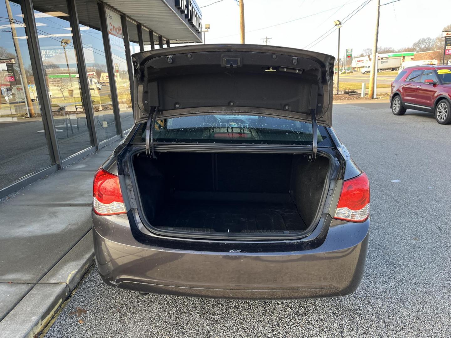 2014 Black Granite Metallic Chevrolet Cruze 1LT Auto (1G1PC5SB0E7) with an 1.4L L4 DOHC 16V TURBO engine, 6-Speed Automatic transmission, located at 1633 W Kimberly, Davenport, IA, 52806, (563) 323-5341, 41.559456, -90.598732 - Photo#5