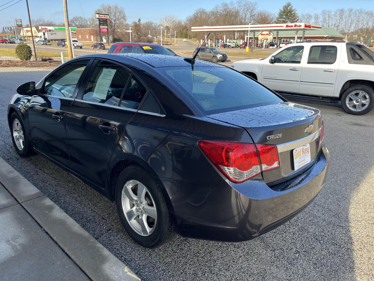 2014 Black Granite Metallic Chevrolet Cruze 1LT Auto (1G1PC5SB0E7) with an 1.4L L4 DOHC 16V TURBO engine, 6-Speed Automatic transmission, located at 1633 W Kimberly, Davenport, IA, 52806, (563) 323-5341, 41.559456, -90.598732 - Photo#3