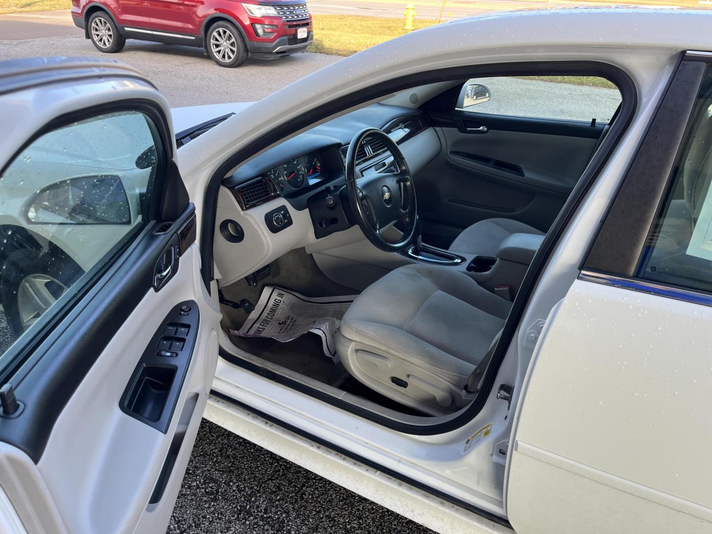 2012 White Chevrolet Impala LT (Fleet) (2G1WG5E38C1) with an 3.6L V6 DOHC 16V FFV engine, 6-Speed Automatic transmission, located at 1633 W Kimberly, Davenport, IA, 52806, (563) 323-5341, 41.559456, -90.598732 - Photo#8