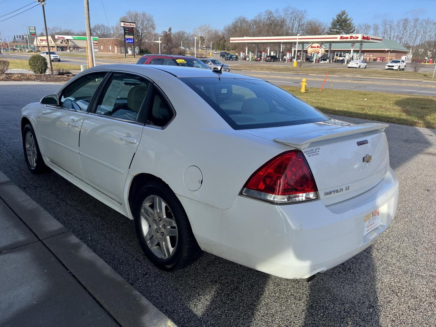 2012 White Chevrolet Impala LT (Fleet) (2G1WG5E38C1) with an 3.6L V6 DOHC 16V FFV engine, 6-Speed Automatic transmission, located at 1633 W Kimberly, Davenport, IA, 52806, (563) 323-5341, 41.559456, -90.598732 - Photo#3