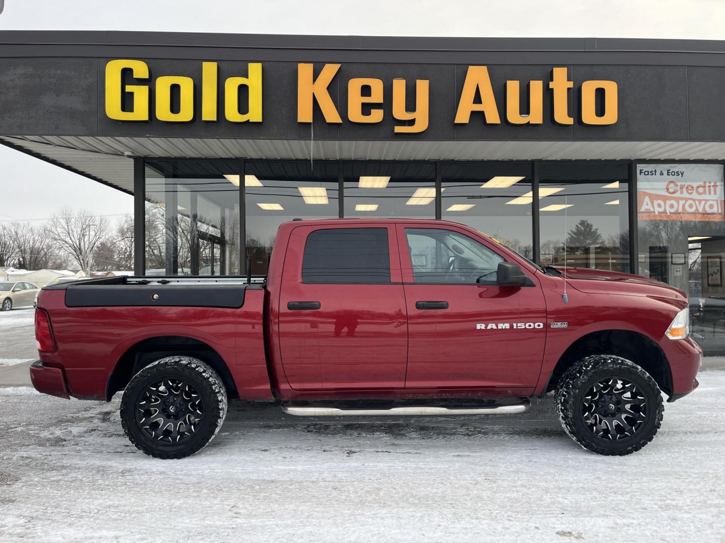 2012 Red Dodge Ram 1500 ST Crew Cab 4WD (1C6RD7KT5CS) with an 5.7L V8 OHV 16V engine, 6-Speed Automatic transmission, located at 1633 W Kimberly, Davenport, IA, 52806, (563) 323-5341, 41.559456, -90.598732 - Photo#0