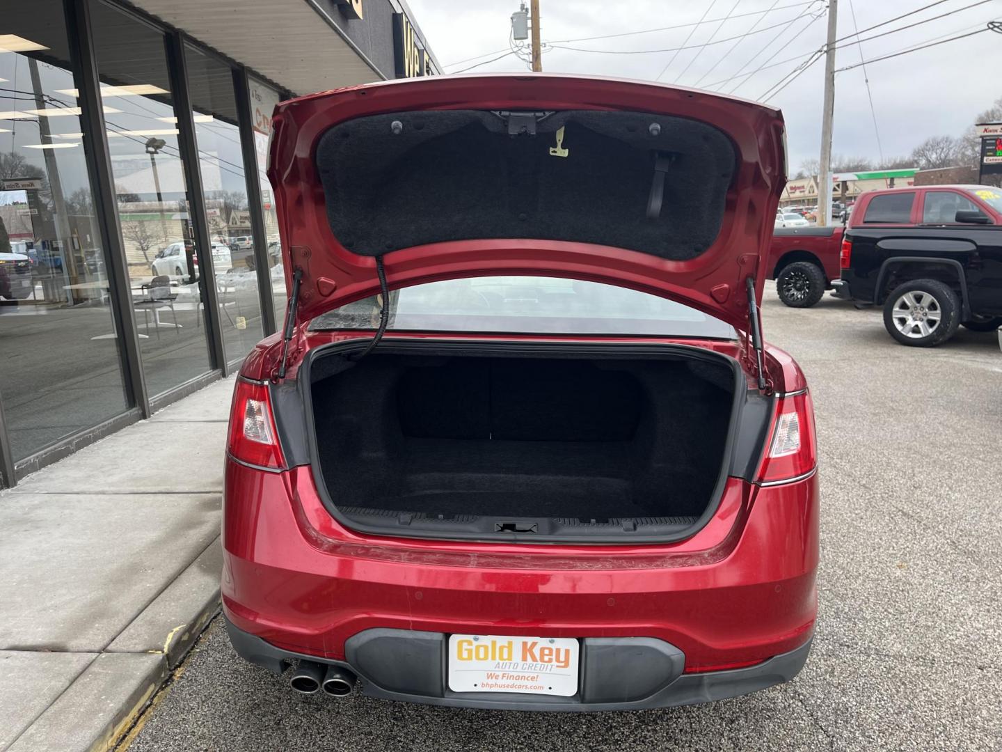 2011 Red Candy Metallic Tinted Clearcoat Ford Taurus Limited (1FAHP2JW2BG) with an Duratec 3.5L V-6 DOHC engine, located at 1633 W Kimberly, Davenport, IA, 52806, (563) 323-5341, 41.559456, -90.598732 - Photo#5