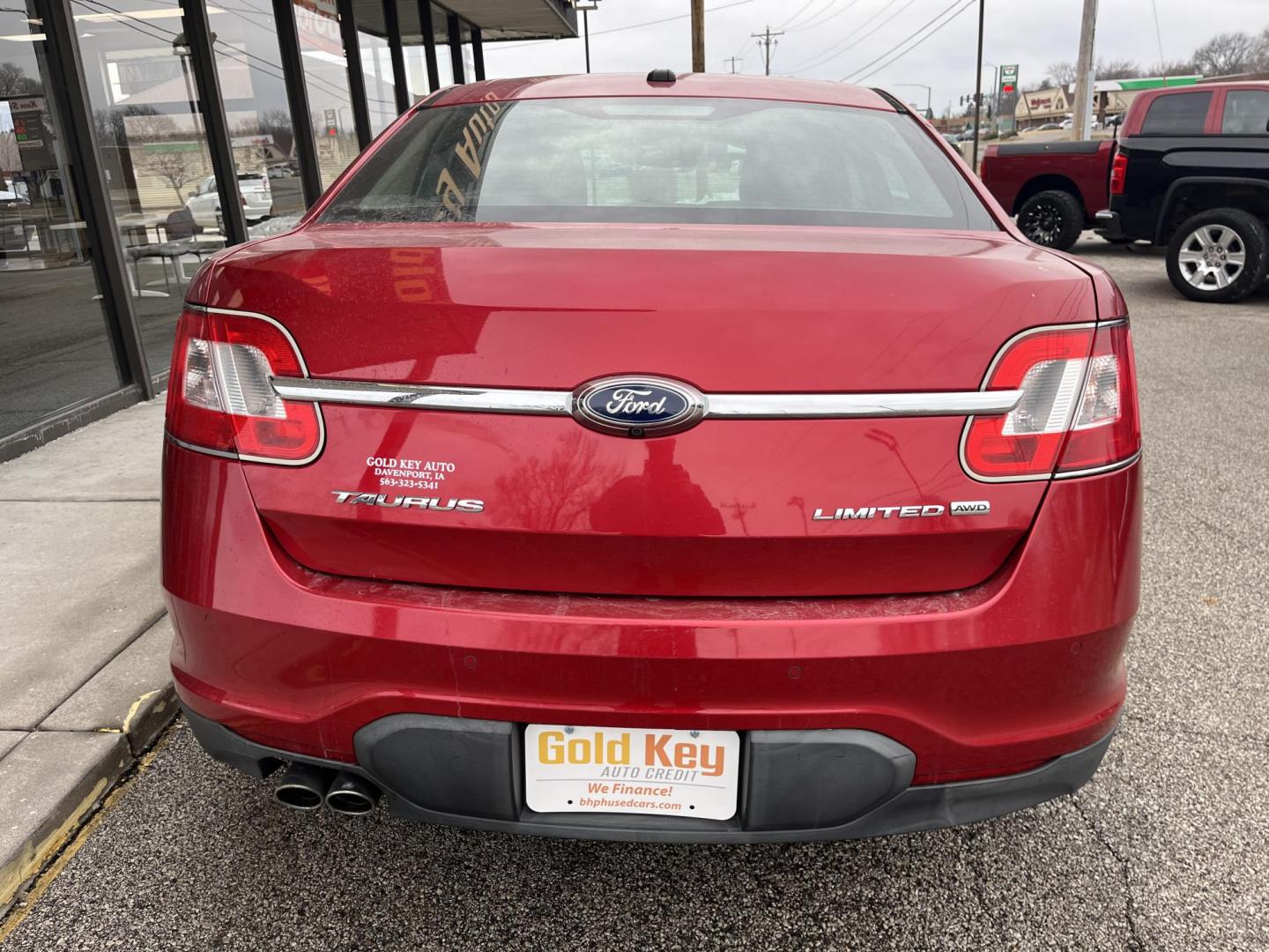 2011 Red Candy Metallic Tinted Clearcoat Ford Taurus Limited (1FAHP2JW2BG) with an Duratec 3.5L V-6 DOHC engine, located at 1633 W Kimberly, Davenport, IA, 52806, (563) 323-5341, 41.559456, -90.598732 - Photo#4