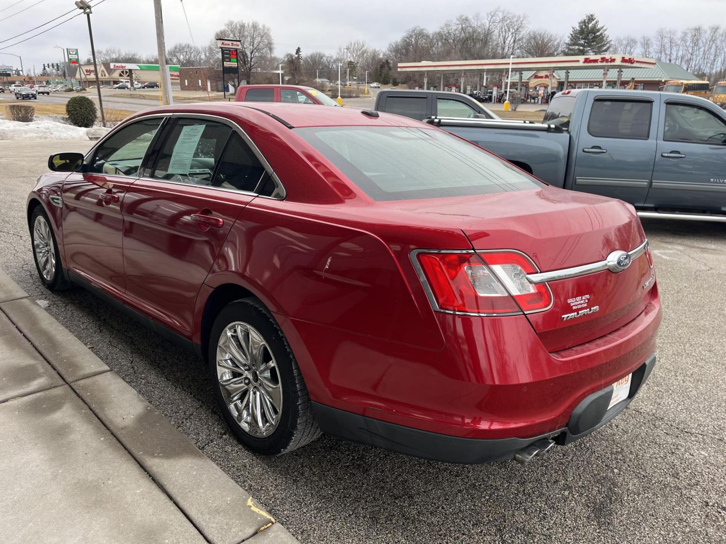 2011 Red Candy Metallic Tinted Clearcoat Ford Taurus Limited (1FAHP2JW2BG) with an Duratec 3.5L V-6 DOHC engine, located at 1633 W Kimberly, Davenport, IA, 52806, (563) 323-5341, 41.559456, -90.598732 - Photo#3
