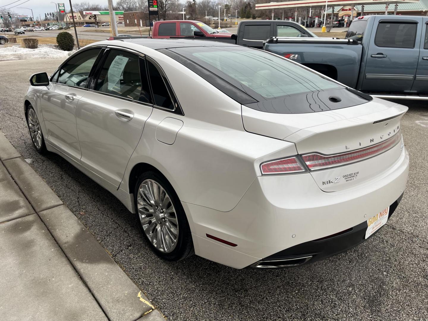 2015 Lincoln MKZ AWD (3LN6L2J92FR) with an 2.0L L4 DOHC 16V engine, 6-Speed Automatic transmission, located at 1633 W Kimberly, Davenport, IA, 52806, (563) 323-5341, 41.559456, -90.598732 - Photo#3
