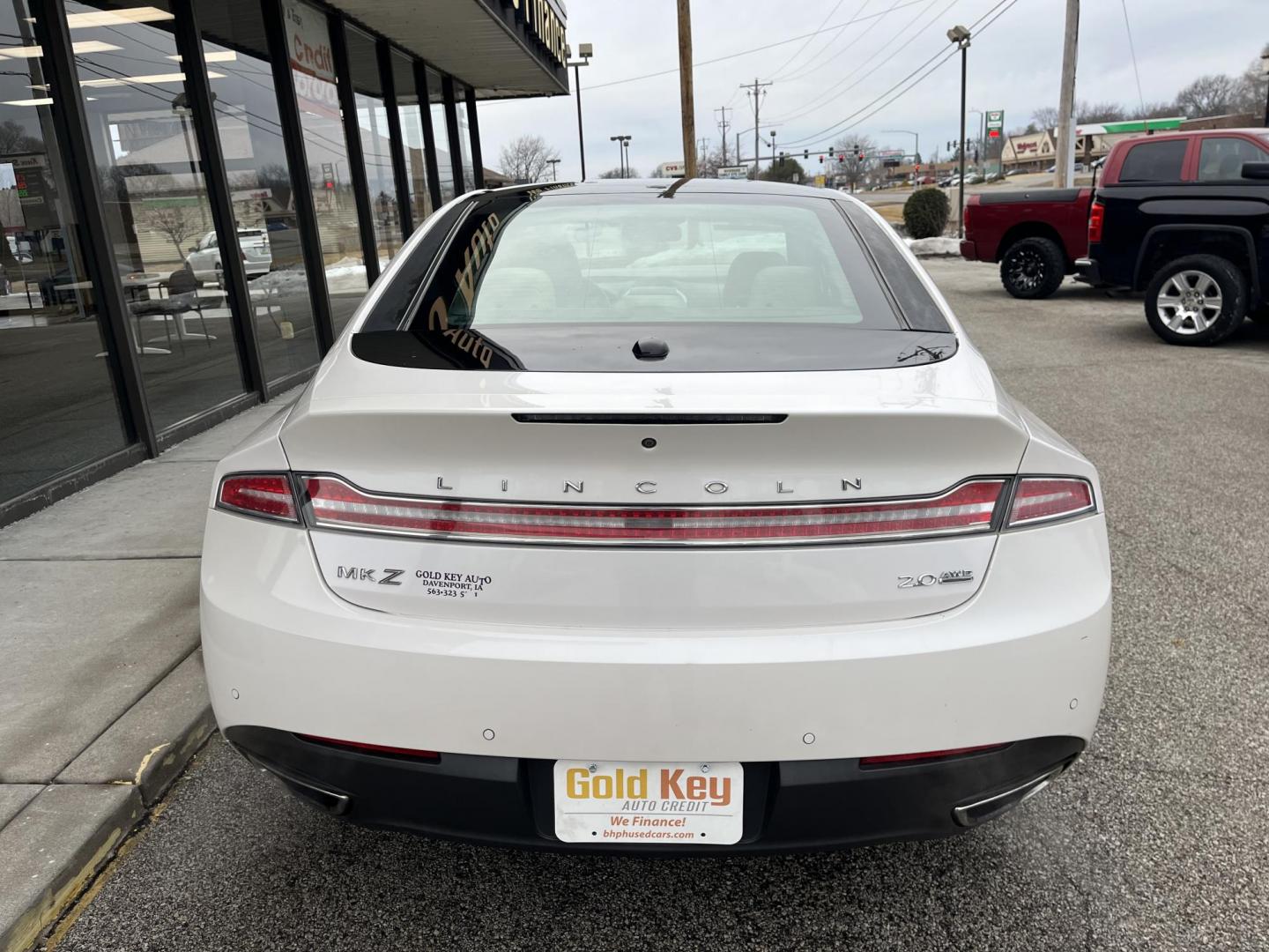2015 Lincoln MKZ AWD (3LN6L2J92FR) with an 2.0L L4 DOHC 16V engine, 6-Speed Automatic transmission, located at 1633 W Kimberly, Davenport, IA, 52806, (563) 323-5341, 41.559456, -90.598732 - Photo#4