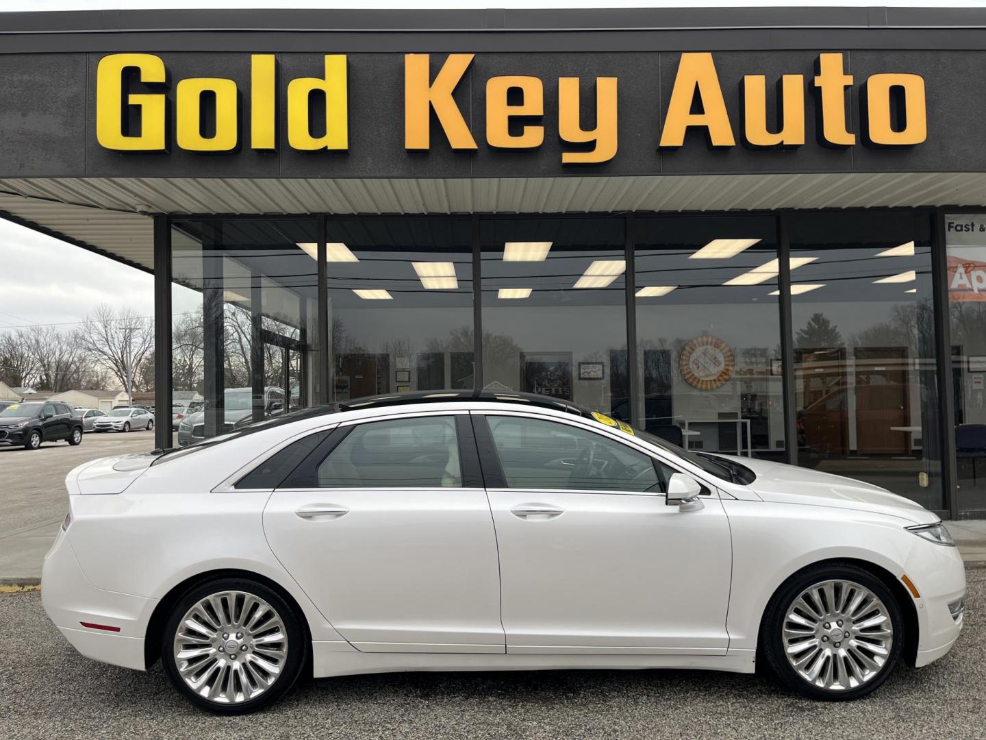 2015 Lincoln MKZ AWD (3LN6L2J92FR) with an 2.0L L4 DOHC 16V engine, 6-Speed Automatic transmission, located at 1633 W Kimberly, Davenport, IA, 52806, (563) 323-5341, 41.559456, -90.598732 - Photo#0