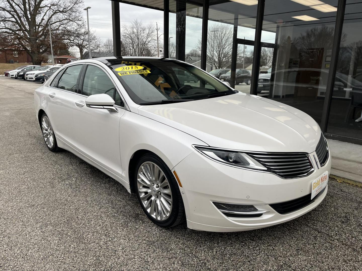 2015 Lincoln MKZ AWD (3LN6L2J92FR) with an 2.0L L4 DOHC 16V engine, 6-Speed Automatic transmission, located at 1633 W Kimberly, Davenport, IA, 52806, (563) 323-5341, 41.559456, -90.598732 - Photo#2
