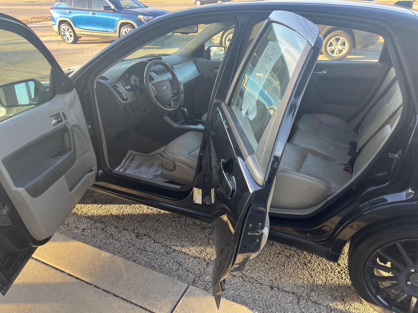 2010 Ebony Ford Focus SES Sedan (1FAHP3GN7AW) with an 2.0L L4 DOHC 16V engine, located at 1633 W Kimberly, Davenport, IA, 52806, (563) 323-5341, 41.559456, -90.598732 - Photo#7