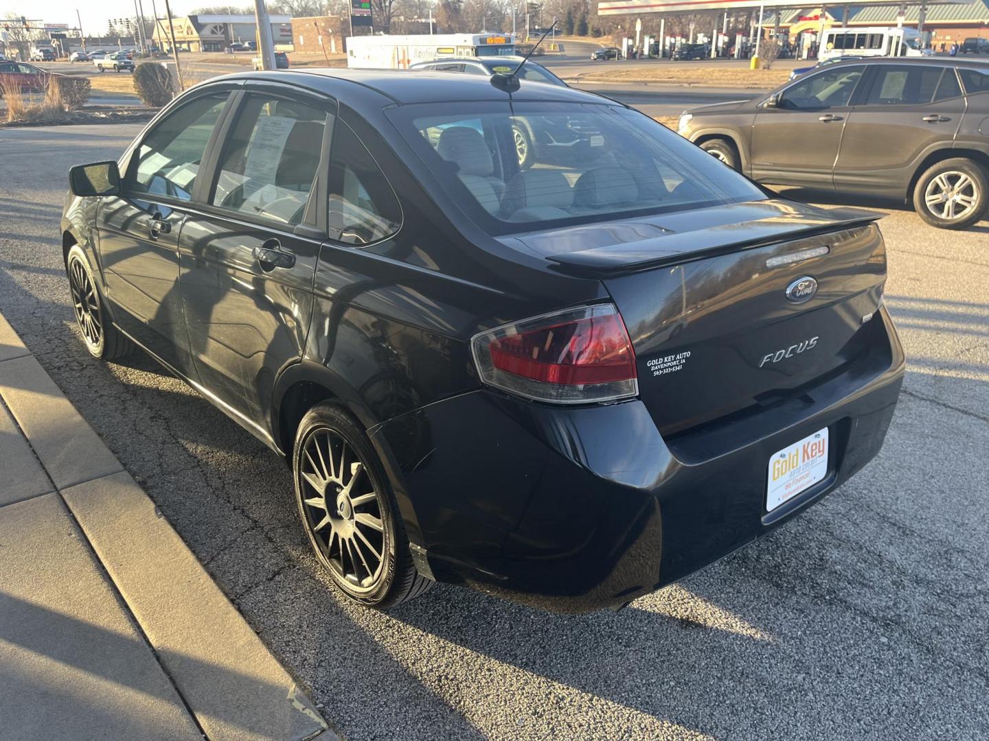 2010 Ebony Ford Focus SES Sedan (1FAHP3GN7AW) with an 2.0L L4 DOHC 16V engine, located at 1633 W Kimberly, Davenport, IA, 52806, (563) 323-5341, 41.559456, -90.598732 - Photo#3