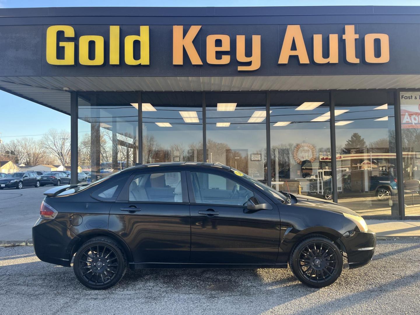2010 Ebony Ford Focus SES Sedan (1FAHP3GN7AW) with an 2.0L L4 DOHC 16V engine, located at 1633 W Kimberly, Davenport, IA, 52806, (563) 323-5341, 41.559456, -90.598732 - Photo#0