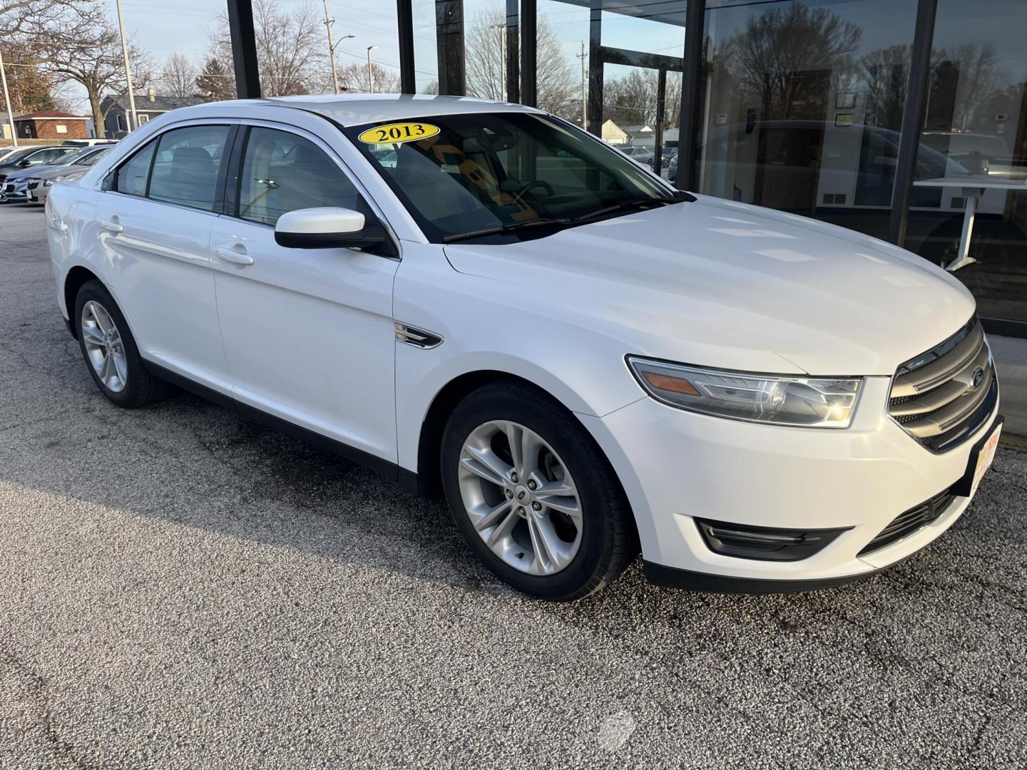 2013 Oxford White Ford Taurus SEL (1FAHP2E80DG) with an 3.5L V-6 DOHC engine, located at 1633 W Kimberly, Davenport, IA, 52806, (563) 323-5341, 41.559456, -90.598732 - Photo#2