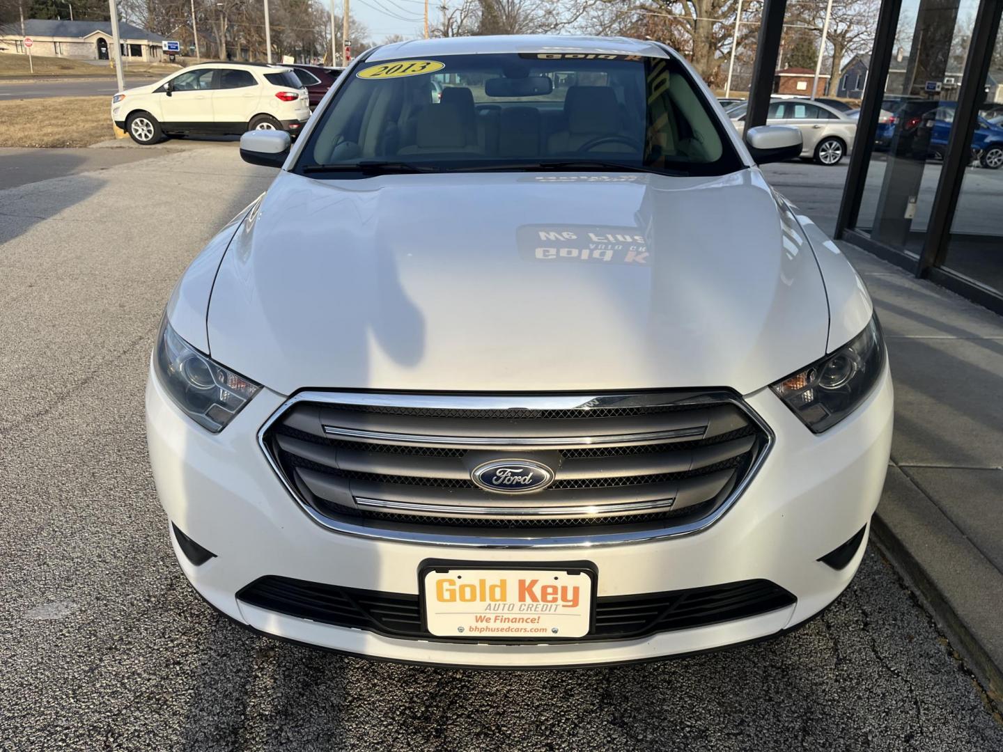 2013 Oxford White Ford Taurus SEL (1FAHP2E80DG) with an 3.5L V-6 DOHC engine, located at 1633 W Kimberly, Davenport, IA, 52806, (563) 323-5341, 41.559456, -90.598732 - Photo#1