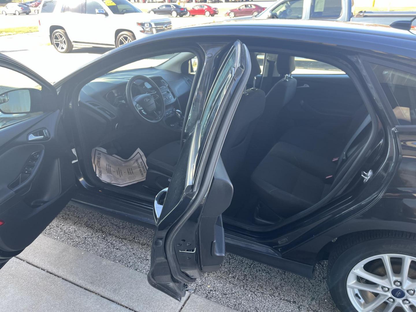 2015 Black Ford Focus SE Hatch (1FADP3K23FL) with an 2.0L L4 DOHC 16V engine, 5-Speed Manual transmission, located at 1633 W Kimberly, Davenport, IA, 52806, (563) 323-5341, 41.559456, -90.598732 - Photo#8