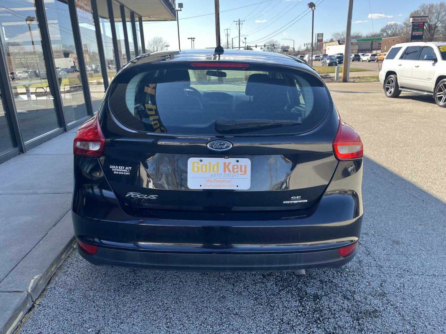 2015 Black Ford Focus SE Hatch (1FADP3K23FL) with an 2.0L L4 DOHC 16V engine, 5-Speed Manual transmission, located at 1633 W Kimberly, Davenport, IA, 52806, (563) 323-5341, 41.559456, -90.598732 - Photo#4