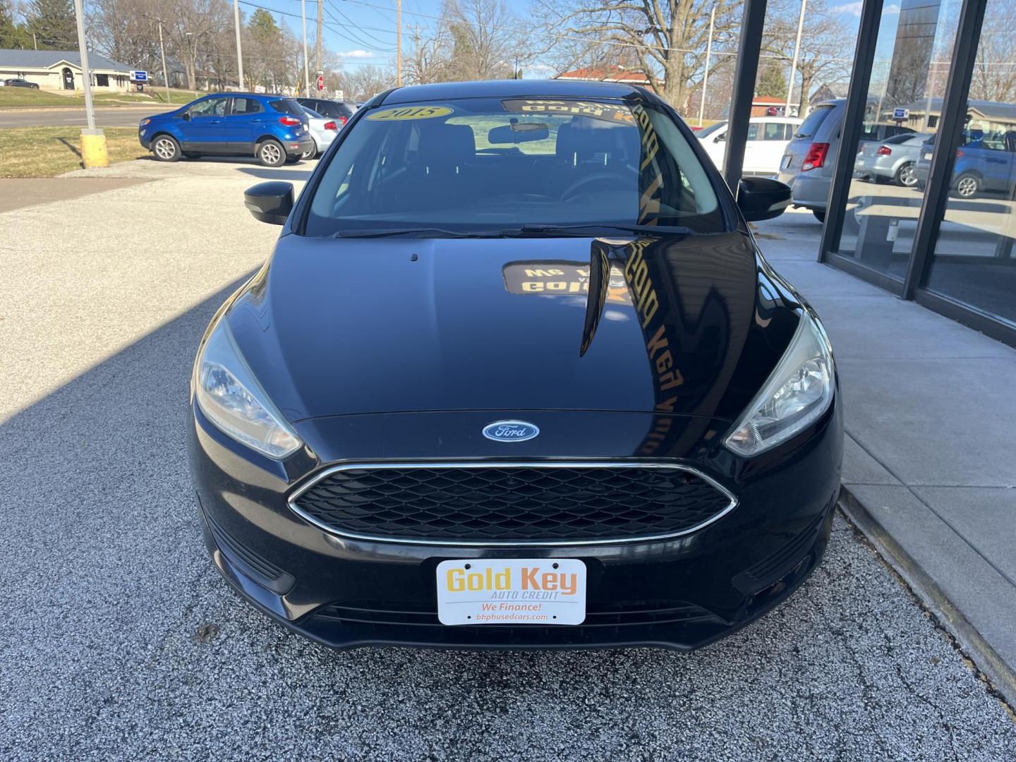 2015 Black Ford Focus SE Hatch (1FADP3K23FL) with an 2.0L L4 DOHC 16V engine, 5-Speed Manual transmission, located at 1633 W Kimberly, Davenport, IA, 52806, (563) 323-5341, 41.559456, -90.598732 - Photo#1