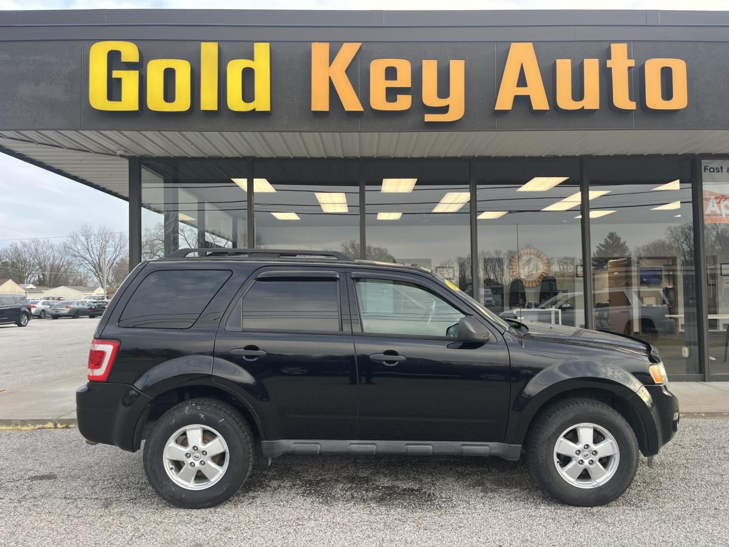 2012 Black Ford Escape XLT (1FMCU9D78CK) , located at 1633 W Kimberly, Davenport, IA, 52806, (563) 323-5341, 41.559456, -90.598732 - Photo#0