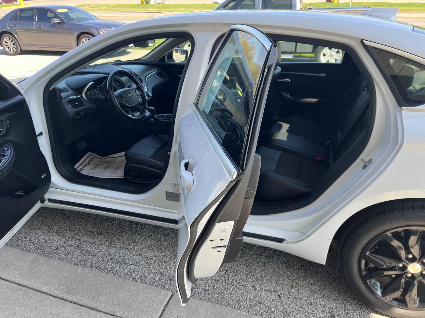 2018 Summit White Chevrolet Impala 1LT (2G1105S30J9) with an Ecotec 2.5L I-4 gasoline direct injection engine, located at 1633 W Kimberly, Davenport, IA, 52806, (563) 323-5341, 41.559456, -90.598732 - Photo#8