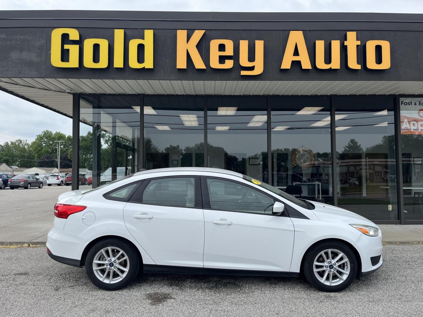 2018 Oxford White Ford Focus SE (1FADP3FE0JL) , located at 1633 W Kimberly, Davenport, IA, 52806, (563) 323-5341, 41.559456, -90.598732 - Photo#0