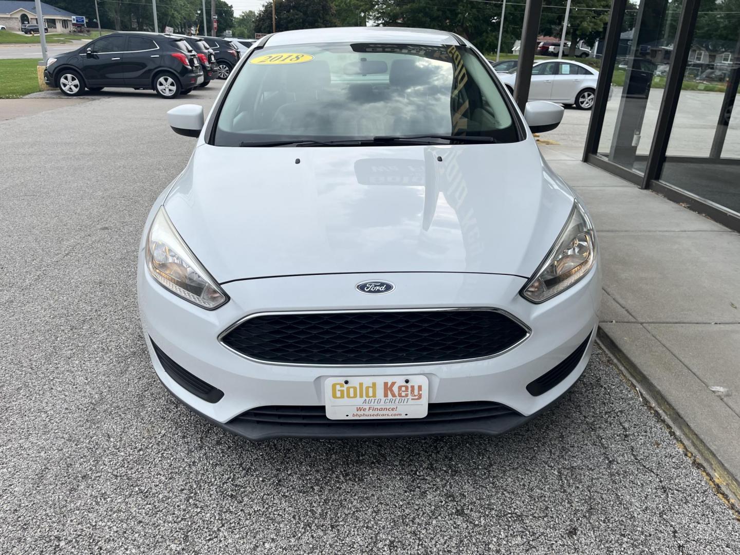 2018 Oxford White Ford Focus SE (1FADP3FE0JL) , located at 1633 W Kimberly, Davenport, IA, 52806, (563) 323-5341, 41.559456, -90.598732 - Photo#1