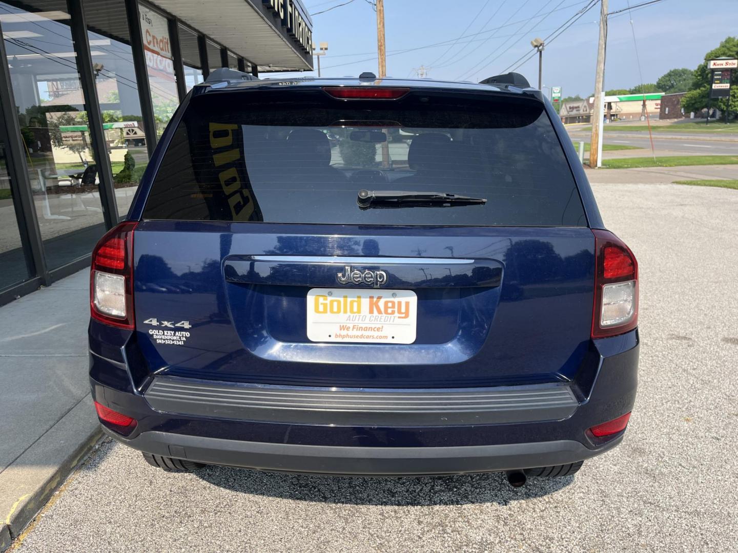 2016 True Blue Pearlcoat Jeep Compass Sport (1C4NJDBB9GD) with an 2.4L I-4 DOHC engine, located at 1633 W Kimberly, Davenport, IA, 52806, (563) 323-5341, 41.559456, -90.598732 - Photo#4